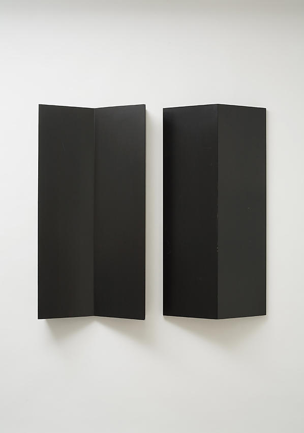 Charlotte Posenenske<br />Relief, Series B, 1967<br />RAL black spray paint on sheet aluminum, concavely and convexly folded<br />39 3/8 x 19 5/8 x 5 1/2 inches<br />
