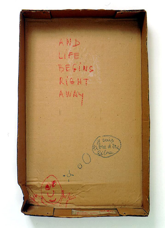 Robert Filliou<br />And Life Begins Right Away [je suis libre d'être libre]<br />c. 1973<br />pastel on cardboard box and glued paper label<br />26 1/2 x 16 1/4 x 3 7/8 inches<br />(67.3 x 41.3 x 9.8 cm)<br />