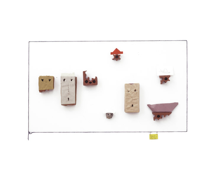 Robert Filliou<br />Marins et capitaines du temps jadis<br />1980<br />bricks, stone, folded paper, pastel on paper,<br />S-hooks and colored twine<br />27 9/16 x 47 13/16 x 1 15/16 inches<br />(70 x 121.5 x 5 cm)<br />