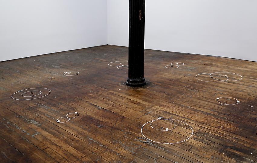 Mel Bochner<br />Vicious Circles<br />1973<br />stones and chalk on floor<br />size determined by installation<br />