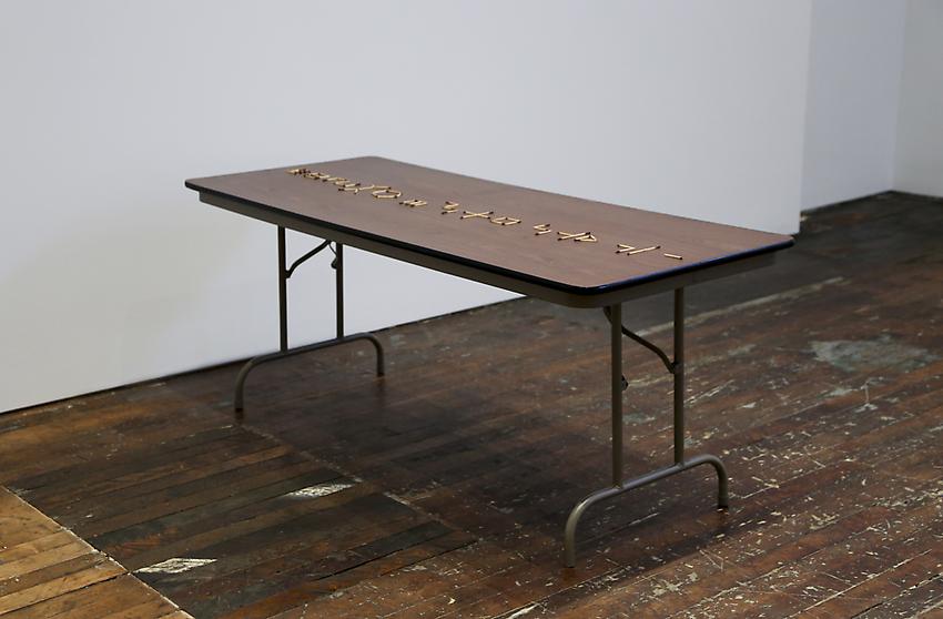 Mel Bochner<br />To Count: Transitive<br />1973<br />burnt matchsticks on folding table<br />size determined by installation<br />