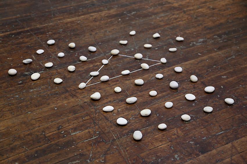 Mel Bochner<br />Meditation on the Theorem of Pythagoras<br />1972/2013<br />stone and chalk on floor<br />size determined by installation<br />