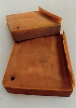 RACHEL WHITEREAD<br />untitled (Grey Bed)<br />1992<br />rubber and polystyrene<br />20 x 94 x 60 inches<br />(50.8 x 238.8 x 152.4 cm)<br />