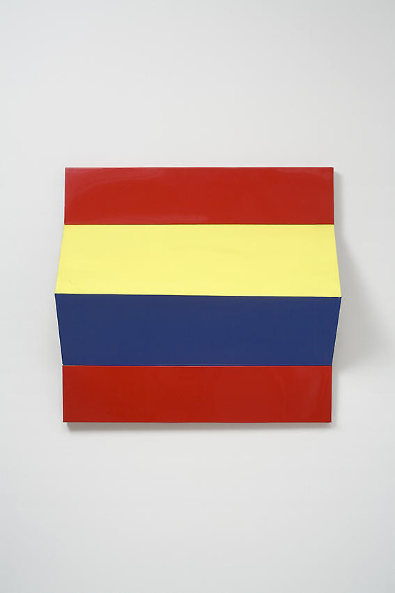 Charlotte Posenenske<br />Faltung (Fold), 1966<br />RAL red, yellow, and blue spray paint on folded sheet aluminum<br />28 1/6 x 26 3/8 x 6 1/4 inches<br />