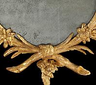An Eighteenth Century Giltwood Oval Mirror