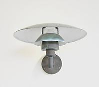 A Patinated Copper Wall Light
