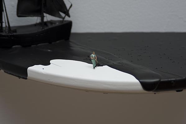 Black Spill (man in green outfit), 2011
Detail
Figurine, ship, and acrylic on wooden shelf, wall installation
6 3/4 x 14 x 7 1/2 inches Image