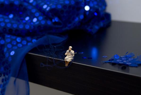 Forced Labor (Seamstress), 2012
Detail
Shelf with figurine and fabric, wall installation
10 x 43 x 10 1/4 inches Image