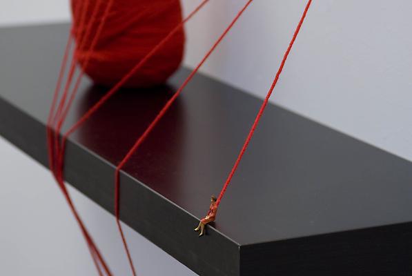 The Anarchist, 2012
Detail
Shelf with figurine and yarn, wall installation
56 x 43 x 10 1/4 inches Image