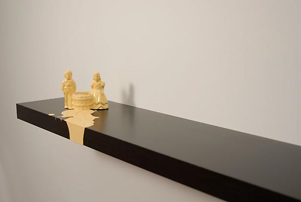 Liliana Porter 
Yellow Drip, 2009
porcelain figurine & acrylic on wooden shelf
7 x 43 x 10 inches Image